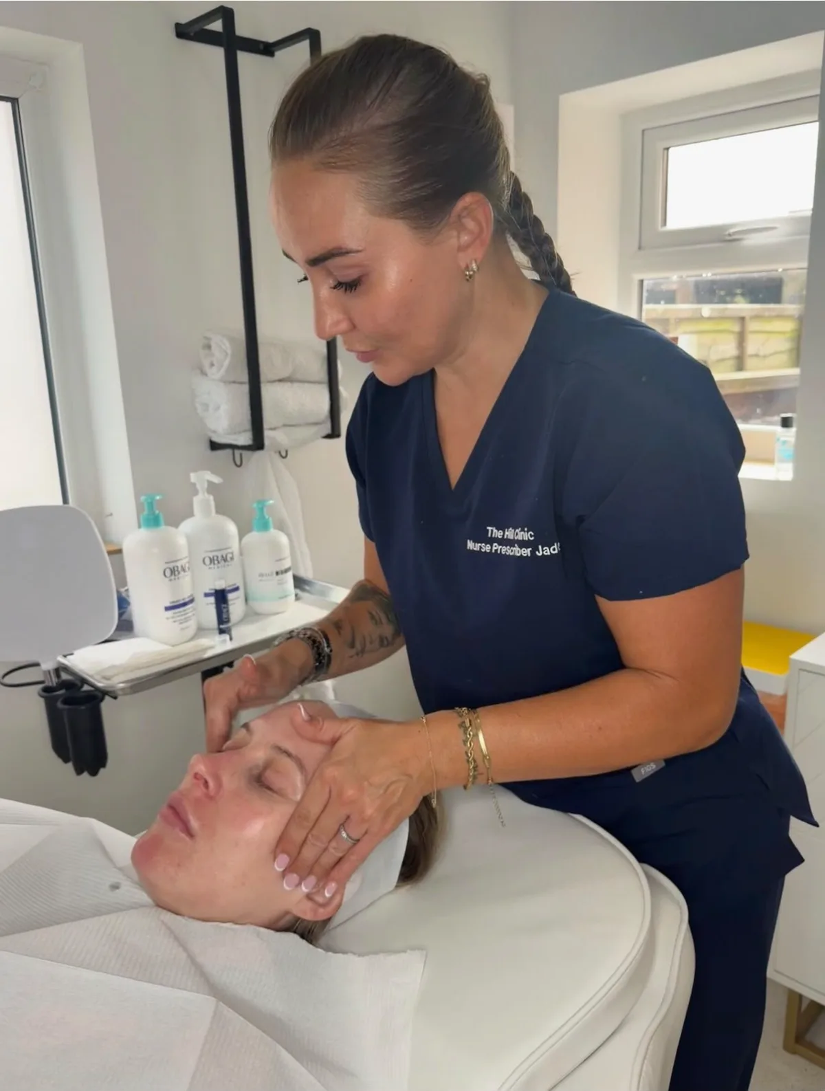 Jade Hill with a client in the treatment chair